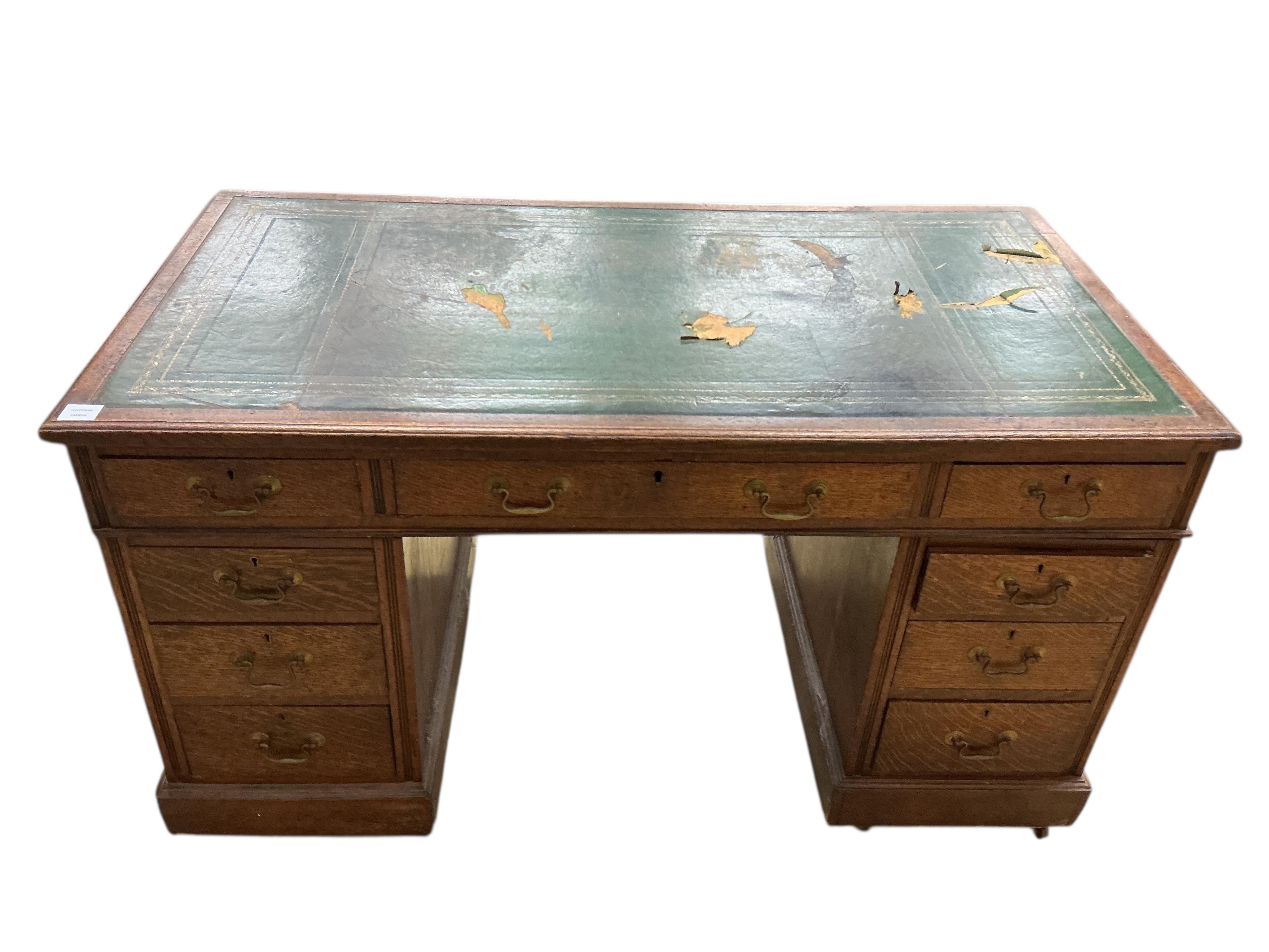 A Victorian oak pedestal desk, width 136cm, depth 72cm, height 75cm